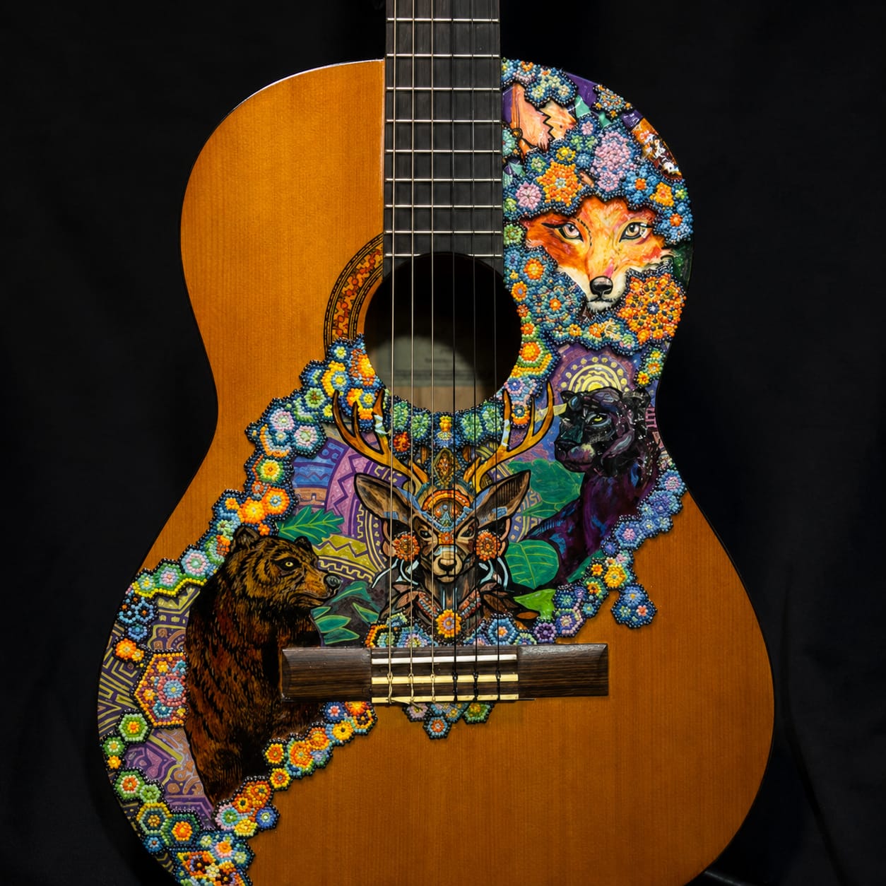 Acabado de la guitarra personalizada con seres del bosque en el medio